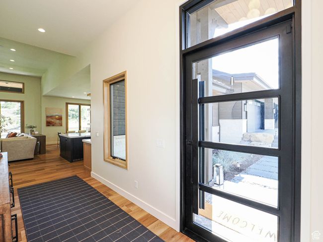 Interior space with wood finished floors and recessed lighting | Image 23