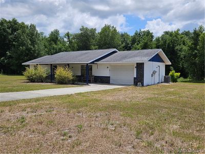 10447 County Road 229 Highway, House other with 3 bedrooms, 2 bathrooms and 1 parking in Oxford FL | Image 1