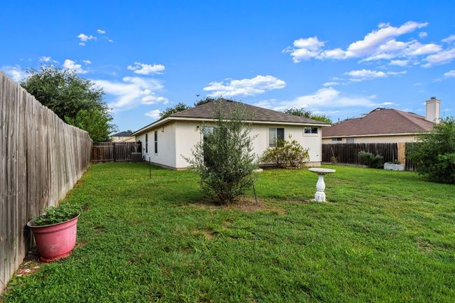 Back of house featuring a fenced backyard | Image 22