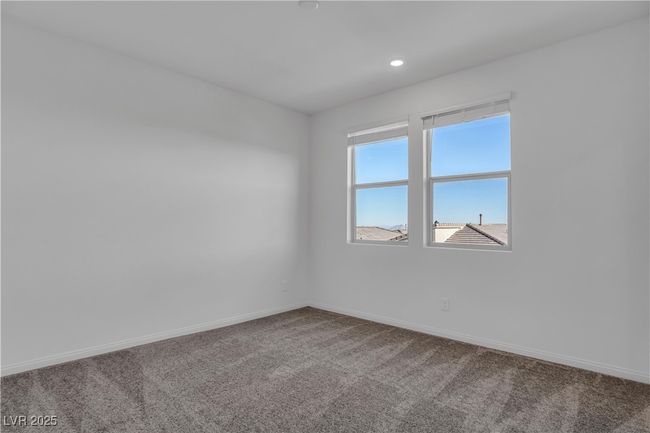 Carpeted empty room with recessed lighting and baseboards | Image 17