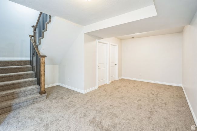 Below grade area with carpet and stairway | Image 6
