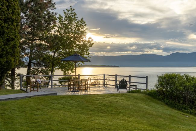 Yard at dusk with a water and mountain view | Image 47