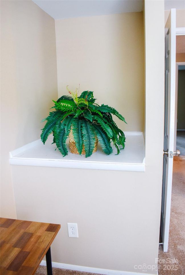Another nook in the primary bedroom next to the office area that could be turned into bookshelves or storage space. | Image 21