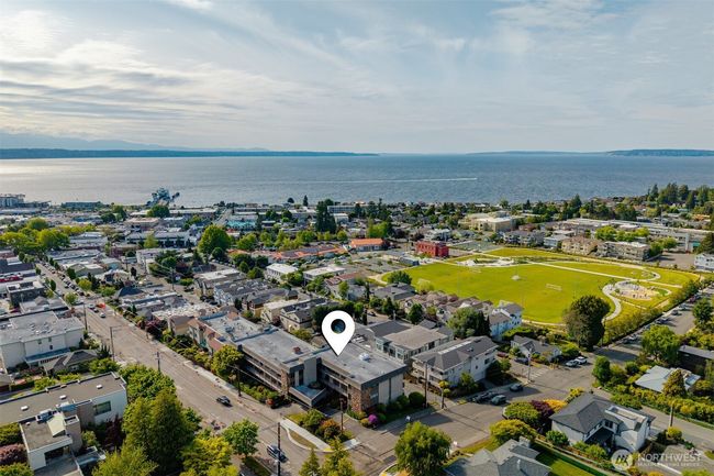 Moments from popular amenities, the park, ferry, and library. | Image 28