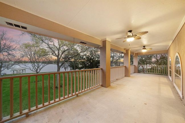 From the serene vantage point of the upstairs balcony, immerse yourself in the sights of the estate's vibrant wildlife. | Image 31