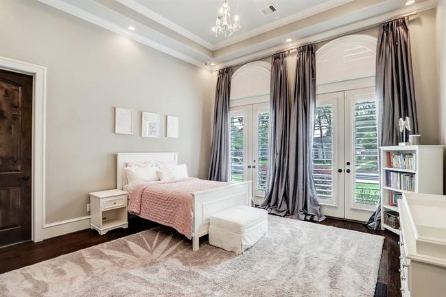 First of two secondary bedrooms downstairs. | Image 25