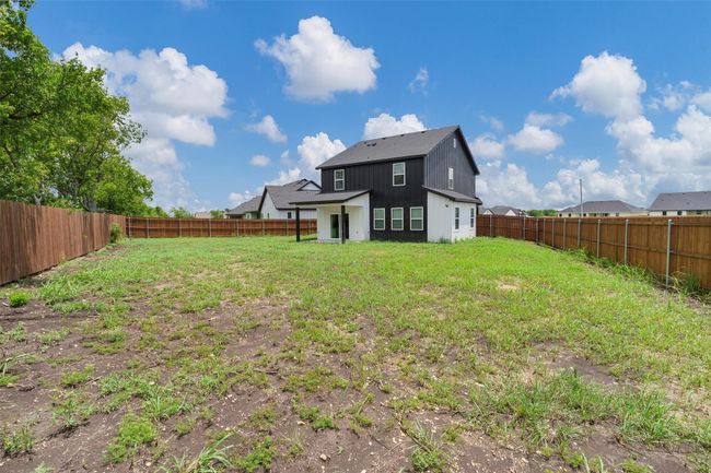 Back of property with a fenced backyard | Image 40