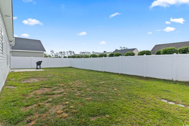 View of yard with a fenced backyard | Image 35