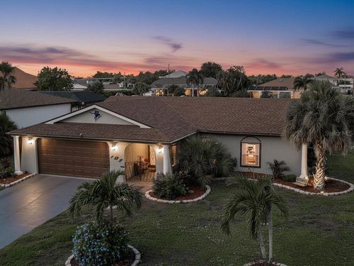 107 Peckham St Sw, PORT CHARLOTTE, FL, 33952-9136 | Card Image