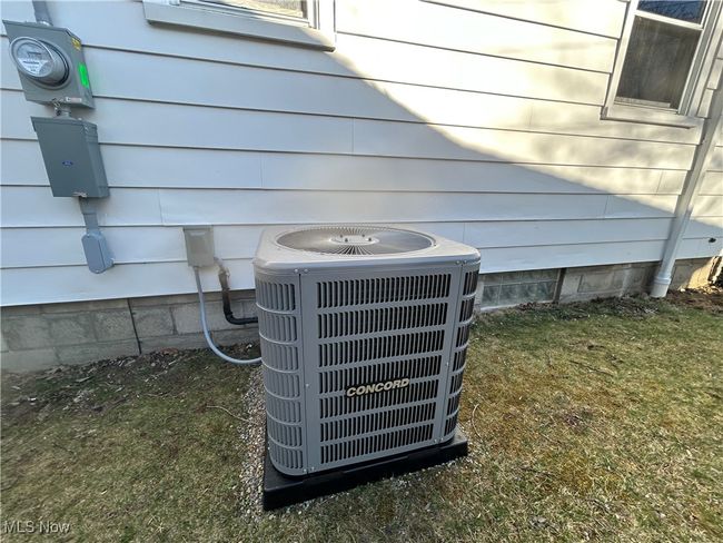 Details featuring new electric meter and new central AC | Image 41