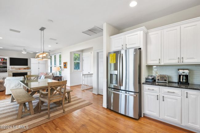 OPEN FLOOR PLAN WITH HALF BATH OFF KITCHEN/DINING RM | Image 10