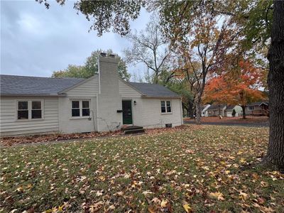 Back of property featuring a yard | Image 1