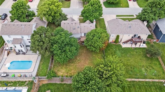 Aerial perspective of suburban area featuring a pool | Image 44
