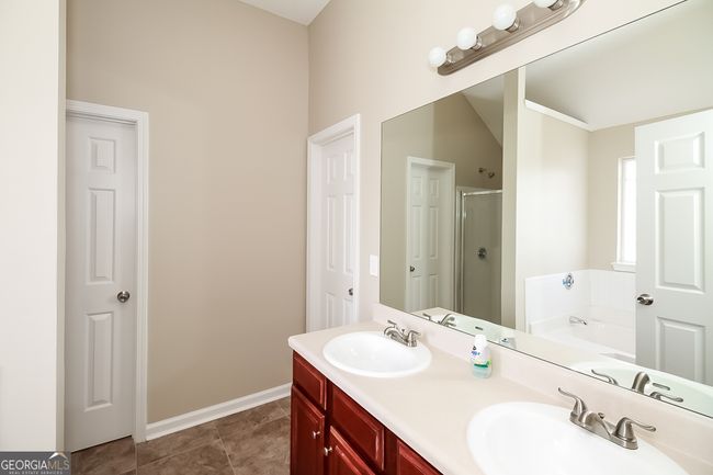 7144 Caspian Dr, House other with 7 bedrooms, 3 bathrooms and null parking in Fairburn GA | Image 10