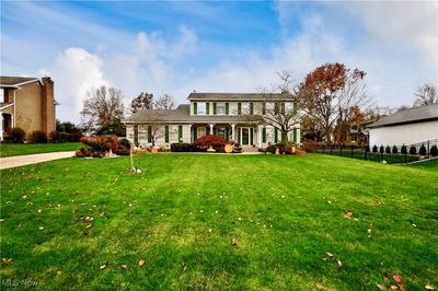 Welcome to 8315 Bricker Rd, NW - a Colonial-style 4 bed, 2.5 bath home located in Jackson Twp! | Image 1