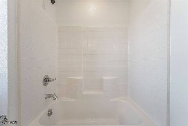 Upstairs Full bath featuring bathtub / shower combination | Image 37