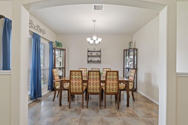 Just inside the front door is the formal dining room. | Image 9