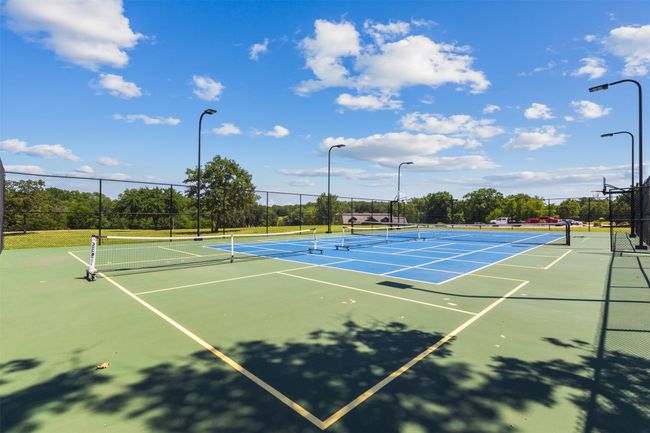 View of tennis court featuring community basketball court | Image 16