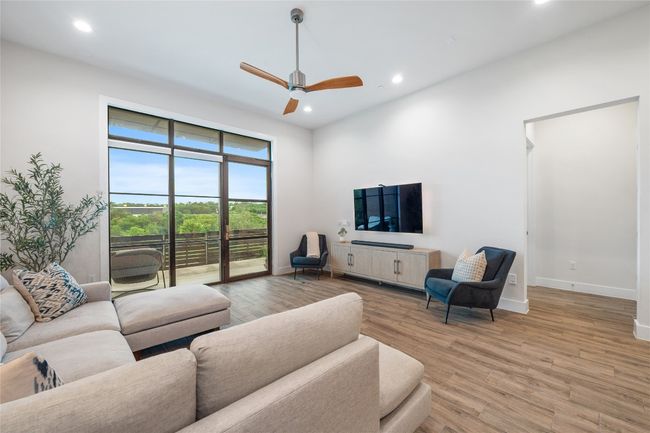 Ground floor living room offers unparalleled and irreplaceable privacy and spectacular views of the Shoal Creek Greenbelt. | Image 4