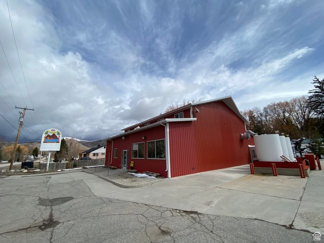 View of home's exterior featuring fence | Image 14