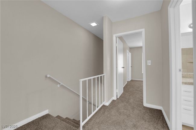 Corridor featuring carpet, an upstairs landing, and baseboards | Image 17