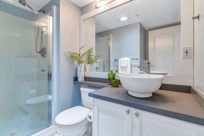 Full bathroom with recessed lighting, toilet, a stall shower, and vanity | Image 23