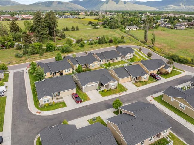 Aerial perspective of suburban area with mountains | Image 23