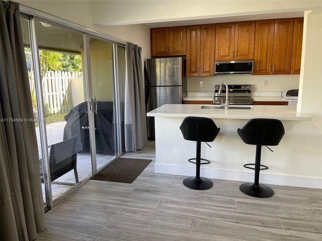 12000 Sw 110 Th Street Cir N, Townhouse with 3 bedrooms, 2 bathrooms and null parking in Miami FL | Image 6