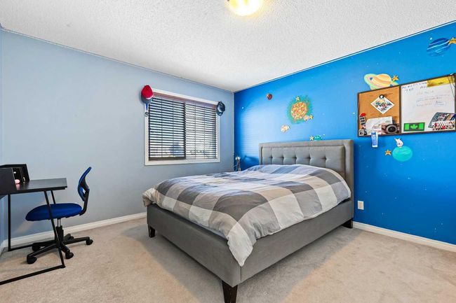 716 Boulder Creek Drive Se, House other with 4 bedrooms, 4 bathrooms and 4 parking in Langdon AB | Image 26