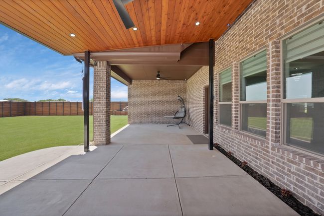 View of patio / terrace featuring a ceiling fan | Image 31