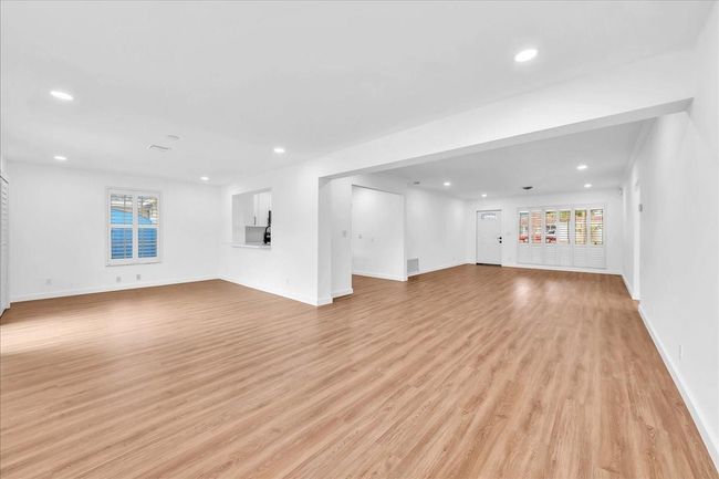 Family Room open to Dining & Living Areas | Image 15