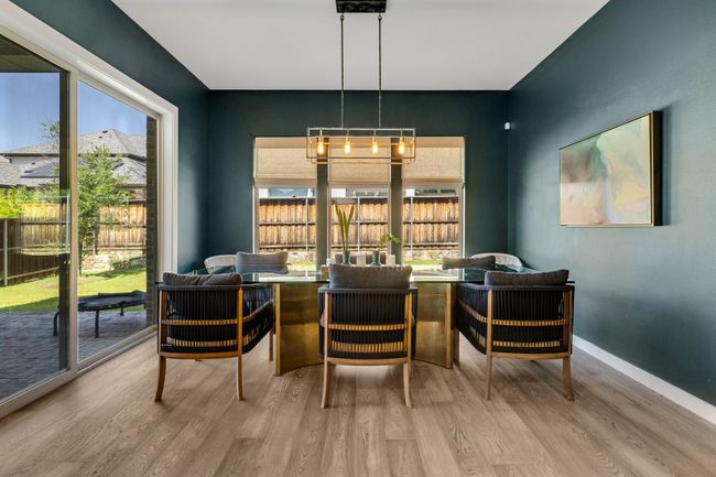 Dining room featuring wood finished floors | Image 17