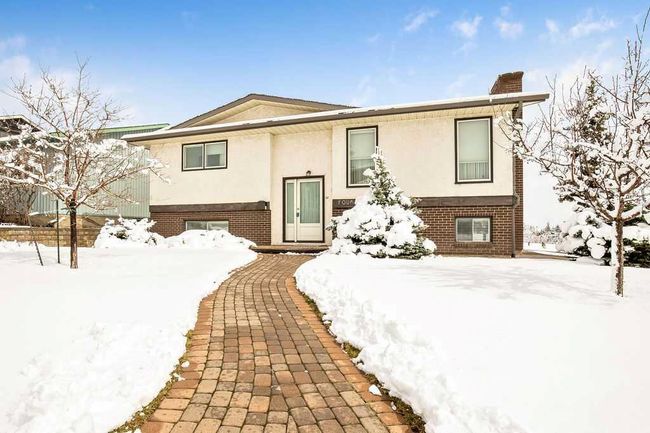 4 Range Green Nw, Home with 4 bedrooms, 2 bathrooms and 4 parking in Calgary AB | Image 26
