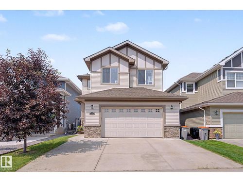 2004 S Creek Dr, House with 4 bedrooms, 4 bathrooms and null parking in Stony Plain AB | Card Image