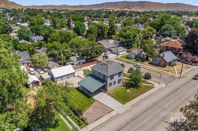 Aerial perspective of suburban area with mountains | Image 5