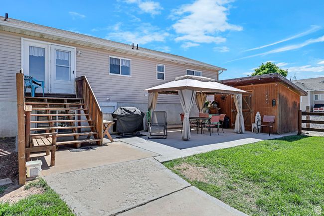 Back of house with a gazebo and a patio | Image 37