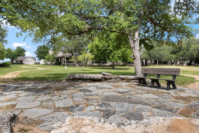 View of property's community with a lawn and a patio area | Image 31