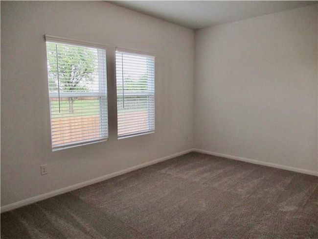 Spare room with carpet flooring | Image 11
