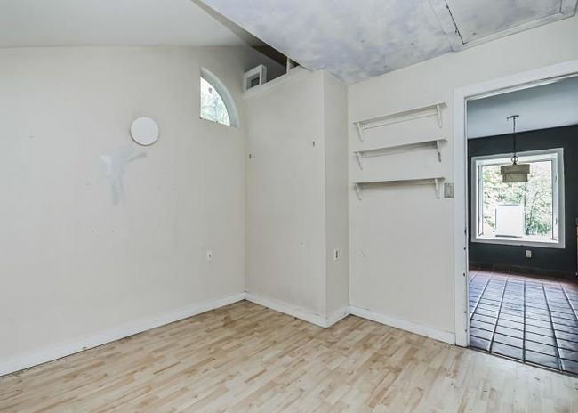 Unfurnished room with light wood-type flooring and a healthy amount of sunlight | Image 10