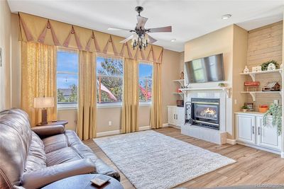 Main floor great room with gas log fireplace and built-ins | Image 3