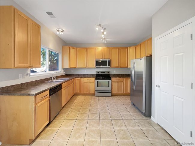 14821 E 117 Th Ave, House other with 4 bedrooms, 3 bathrooms and 2 parking in Commerce City CO | Image 4