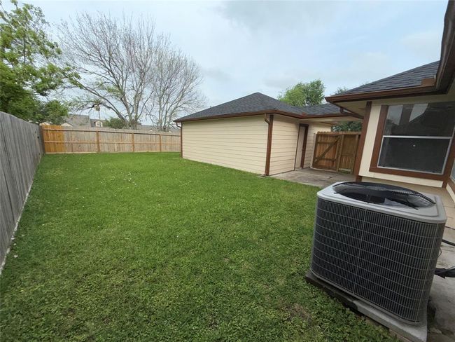 view of the back yard from the house | Image 25
