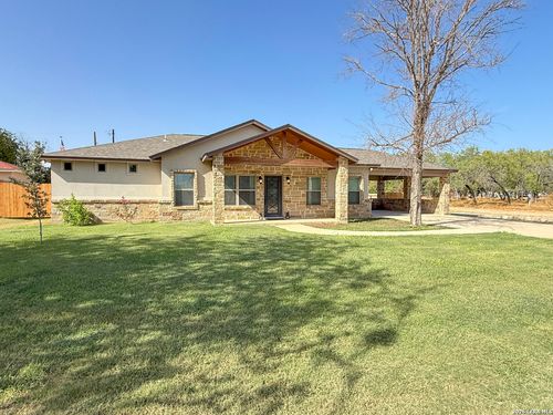 300 Bluebonnet Ave, Devine, TX, 78016-2402 | Card Image