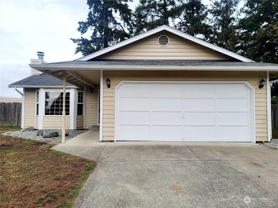 Lg 2 car garage and room in drive for at least two cars PLUS a huge RV parking area just out of sight to the right | Image 1