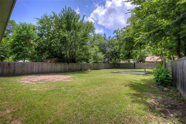 Fenced backyard featuring a patio | Image 30