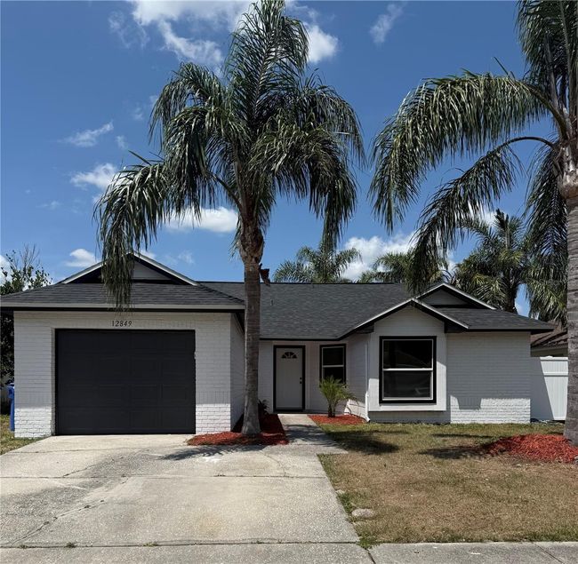 12849 Coverdale Dr, House other with 3 bedrooms, 2 bathrooms and null parking in Tampa FL | Image 4