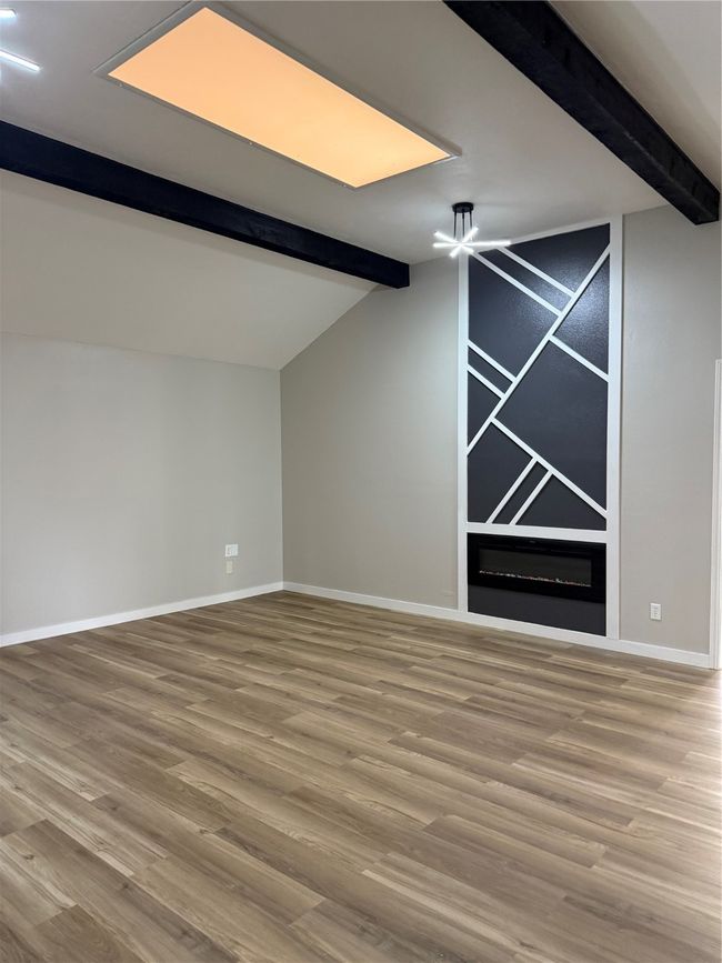 Unfurnished dining area with baseboards, visible vents, and light wood-style floors | Image 5