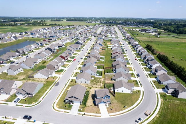 aerial view of property's location featuring a nearby body of water and nearby suburban area | Image 37