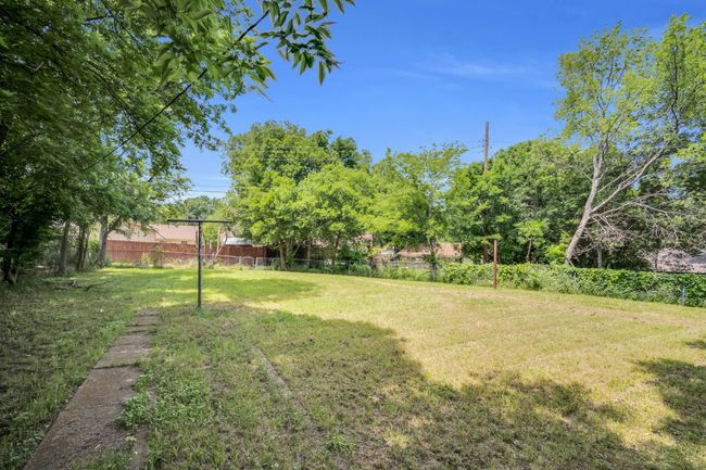 View of yard featuring fence | Image 28