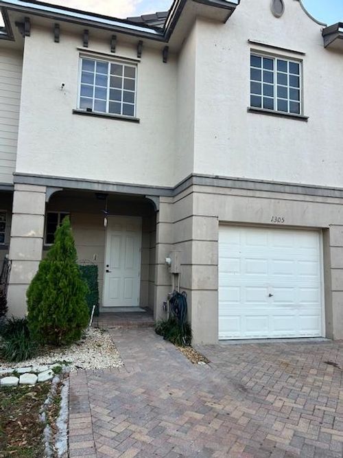 1305 Lucaya Dr, Riviera Beach, FL, 33404-6452 | Card Image